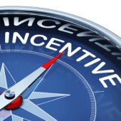 A blue compass with the word "incentive" written on the outer border.