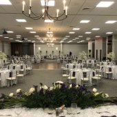 The interior of the Pelham Civic Complex & Ice Arena Banquet Hall decorated for a wedding reception.