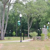 Pelham's new Park 124 features a stone entrance way, picnic tables, a walking trail, pavilion, and greenspace.