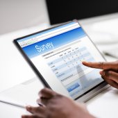 A computer screen with the word "Survey" on it.