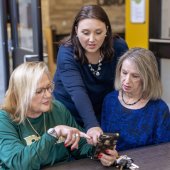A librarian demonstrates the new app for the Pelham Public Library.