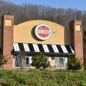 The exterior of Little Tomato is shown. The restaurant is set to open soon.