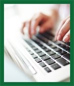 Person typing on a keyboard