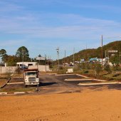 Curbing and parking lot construction at the commercial development adjacent to Pelham Public Library.